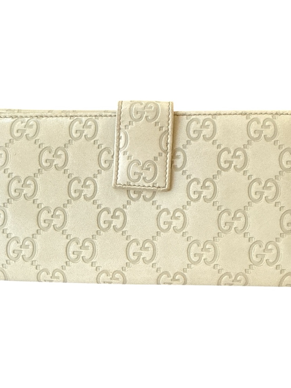 Gucci Embossed GG Continental Wallet in Cream